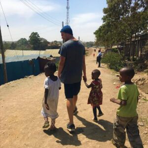 Volunteer Sebastian Gaik with children in Kenya